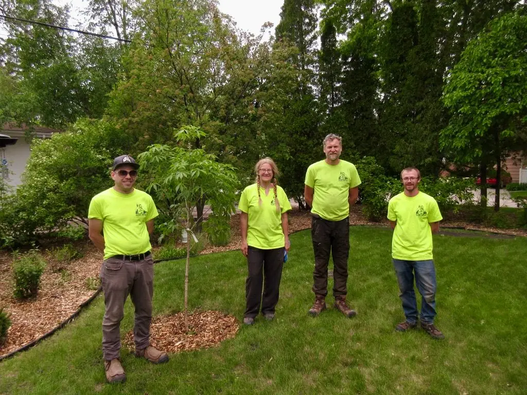Pierre Bunyan crew Pierre Bunyan crew on lawn at Winnipeg job site